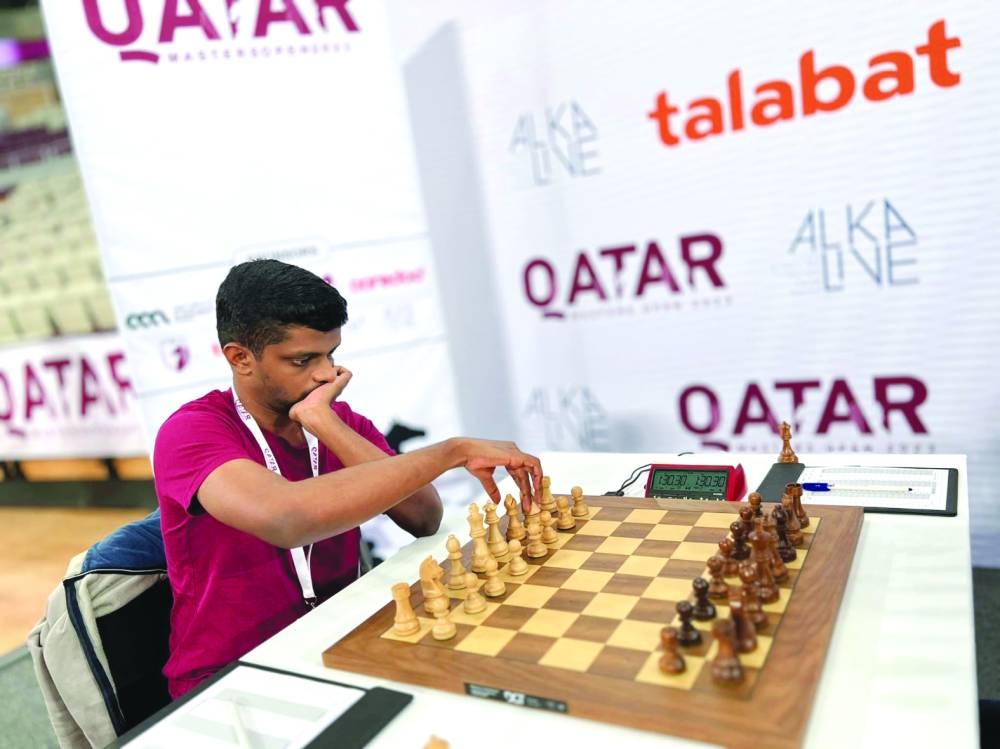 Carlsen jumps in standings with win, Qatar's Aziz plays out draw