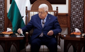 Palestinian president says Gaza war must end, conference needed to reach settlement