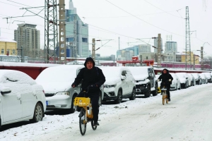 Cold wave freezes most of China, shutting highways and roads