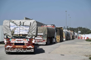  Gaza-bound aid trucks endure grueling wait at border