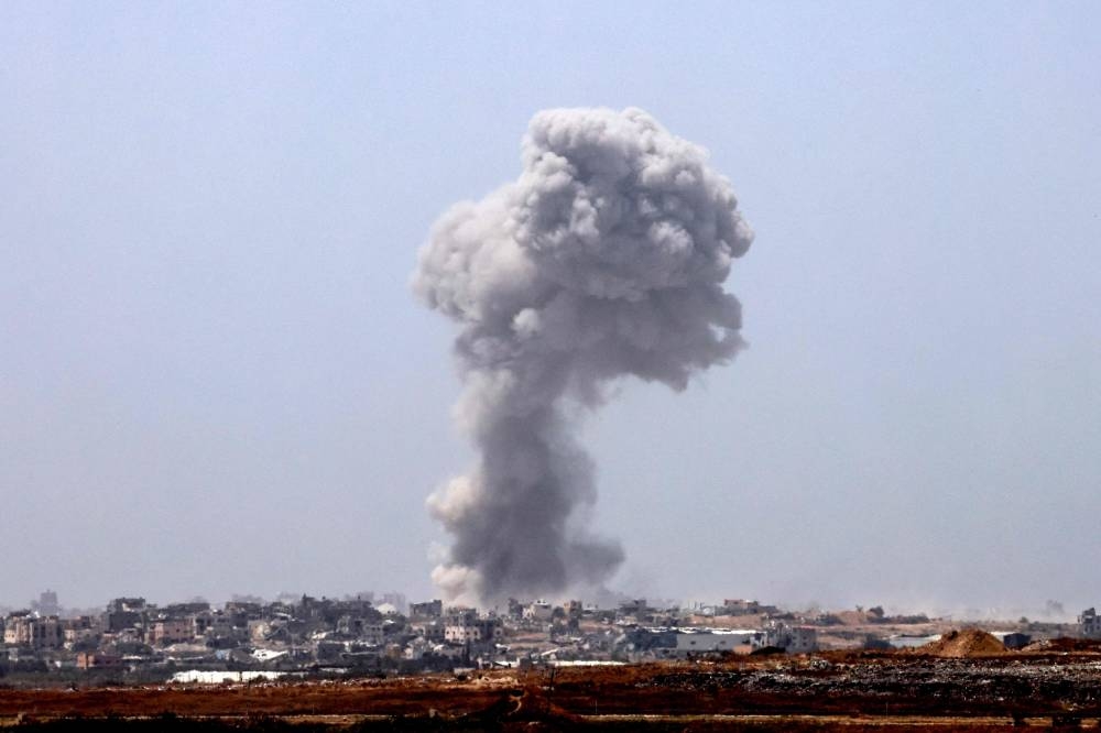 Israeli forces raze parts of Gaza’s Jabalia, hit Rafah with airstrikes