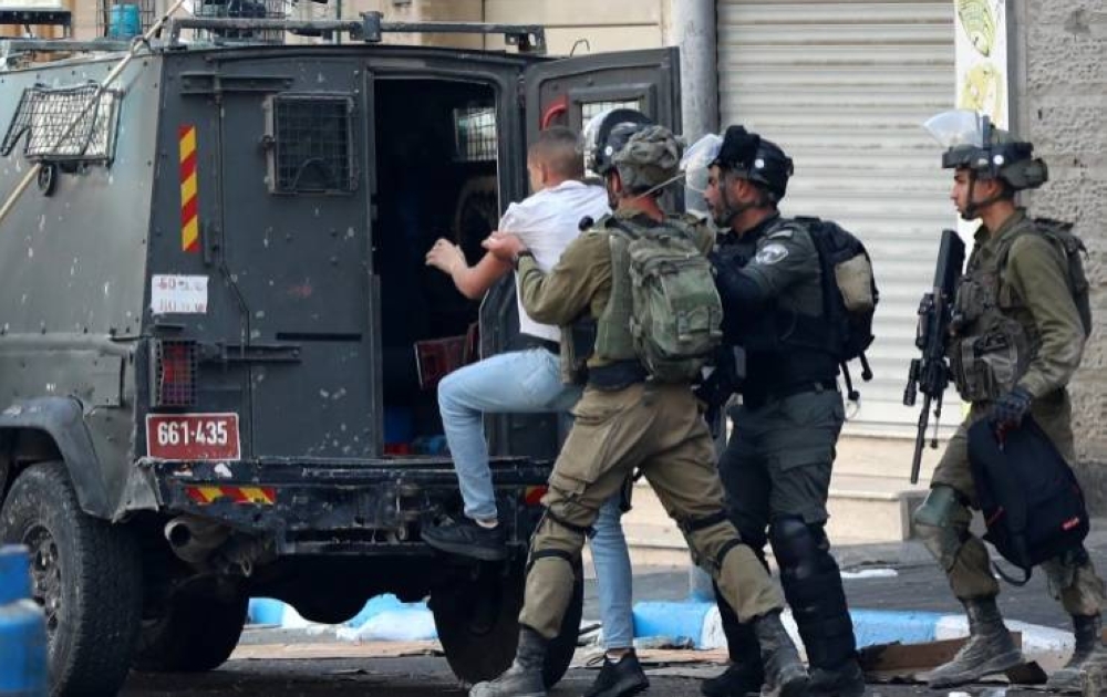 IOF arrests 15 Palestinians in West Bank