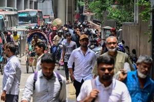 Bangladesh banks,factories reopen as curfew eased after protests taper off