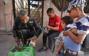 Besieged Gazans share shoes, wear same clothes for months