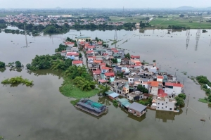 Thousands of children cut off from school by north Vietnam floods