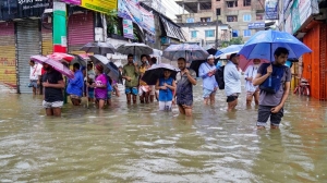 Floods swamp Bangladesh as nation finds its feet after protests