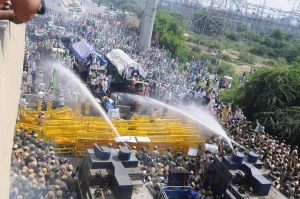 India police fire tear gas, water cannon at protesters