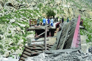 Railway track hangs off bridge after attacks