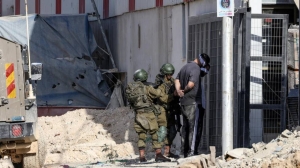 IOF arrests 36 Palestinian civilians in West Bank