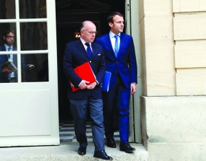 Macron to meet Cazeneuve amid search for PM