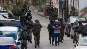 Occupation forces arrest 15 Palestinians in wide-scale raid in Bethlehem