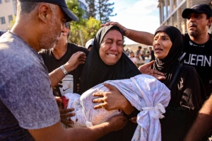 13 children, six women among 21 killed in Israeli strike on Gaza school