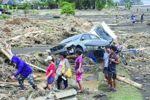 76 dead a storm wreaks havoc across Philippines