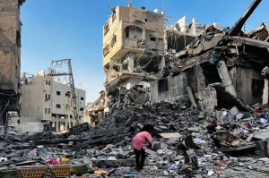 Gaza rescuers dig for survivors after Israeli strike kills 93