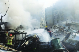 Portraits of slain leaders watch out on Hezbollah’s battered Beirut bastion