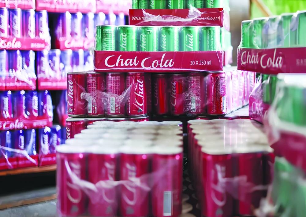 Palestinians turn to local soda in boycott of Israel-linked goods