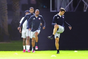 Qatar players getting ready for the crucial World Cup qualifier match against UAE