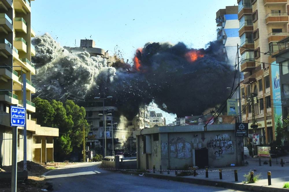 11-storey building toppled as Israel keeps up Lebanon strikes