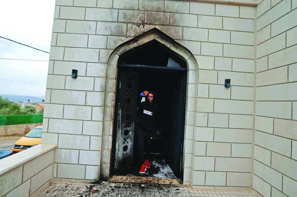 Palestinians accuse settlers of West Bank mosque fire