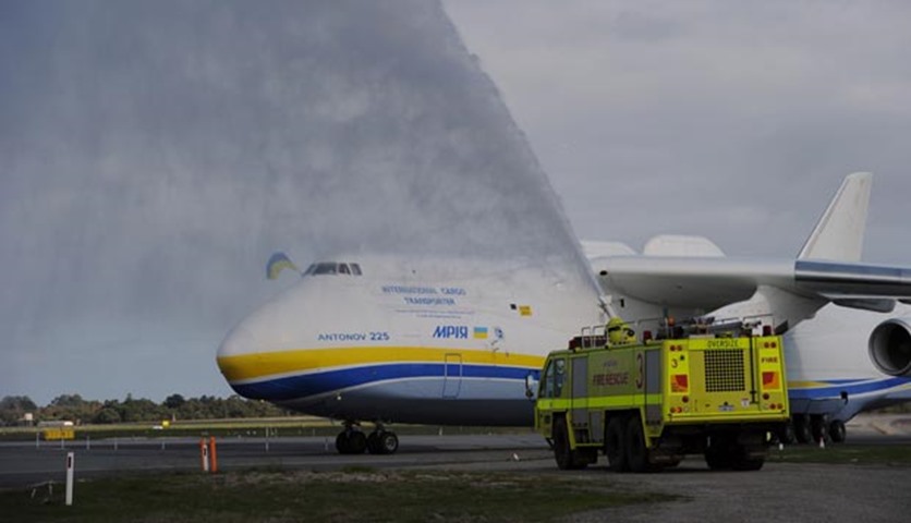 The world\'s largest aircraft is sprayed with water after touching down at Perth Airport on Sunday