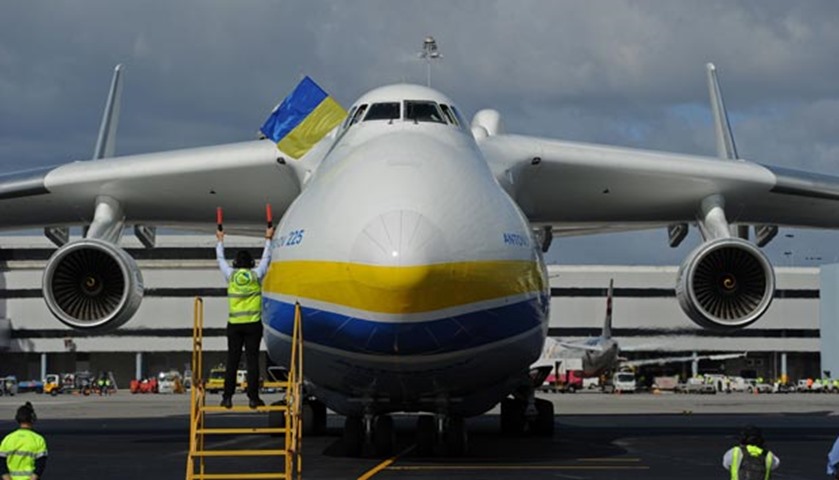 The Ukraine-built Antonov An-225 Mriya is guided into position after touching down at Perth Airport