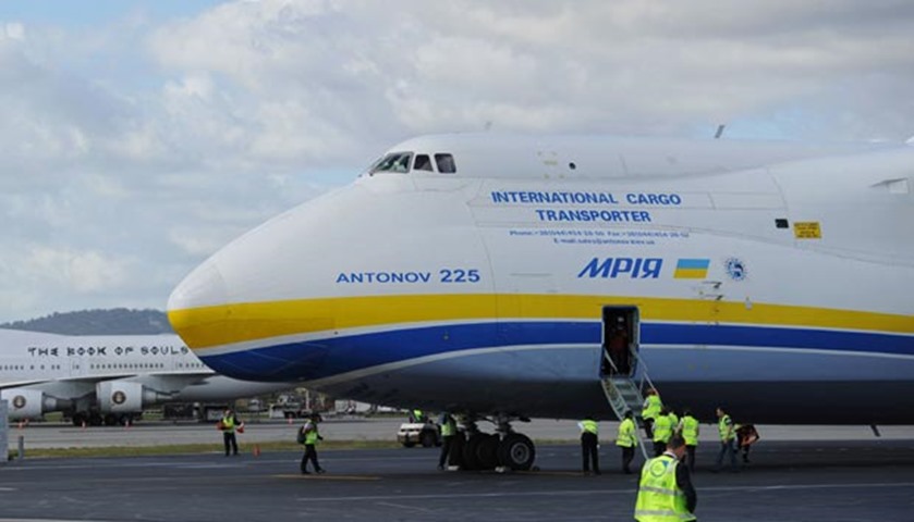 The Antonov An-225 sits alongside a plane owned by British heavy metal band Iron Maiden at Perth