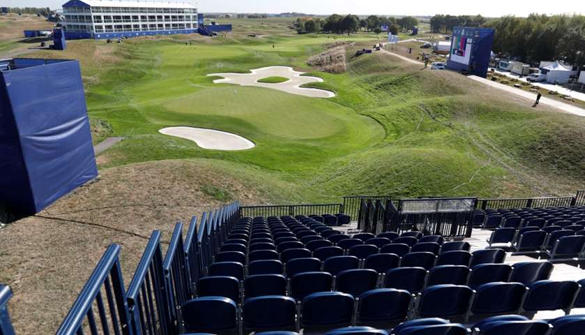 Groundstaff prepare the golf course