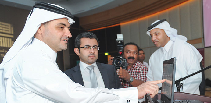 Ashghal president Nasser Ali al-Mawlawi unveiling the new bilingual website. PICTURE: Noushad Thekkayil.