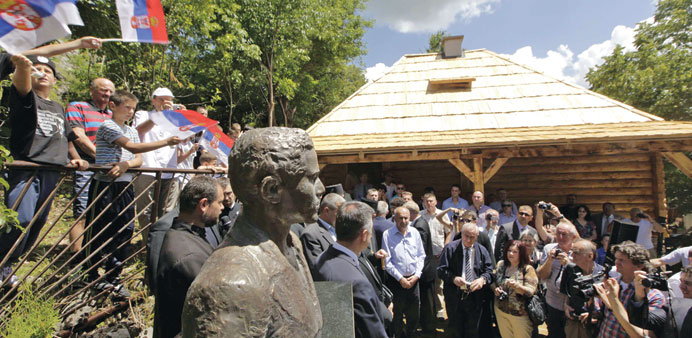 People attend the opening ceremony yesterday of the restored birth house of Gavrilo Princip, in Obljaj.