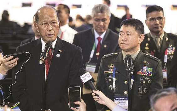 Defence Secretary Delfin Lorenzana (left) with Armed Forces of the Philippines (AFP) chief Eduardo Ano, answers questions during a press conference in Clark, east of Manila yesterday.