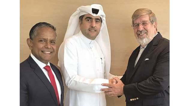 Katara Hospitality chief executive Hamad al-Mulla with Minor International chairman William Heinecke and Minor Hotels chief executive Dillip Rajakarier.