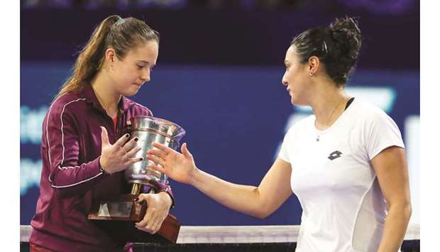 Russiau2019s Daria Kasatkina (left) is congratulated by her final opponent Ons Jabeur of Tunisia during the prize distribution ceremony for the Kremlin Cup in Moscow, Russia, yesterday. (Reuters)