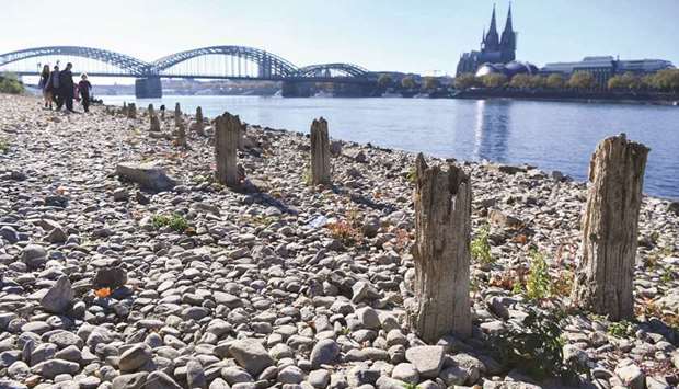 This picture taken on October 21 shows a general view of the Rhine river, which is at record low level, in Cologne. Months of drought have left water levels on Germanyu2019s Rhine river at a record low, exposing a World War II bomb and forcing ship operators to halt services to prevent vessels from running aground.