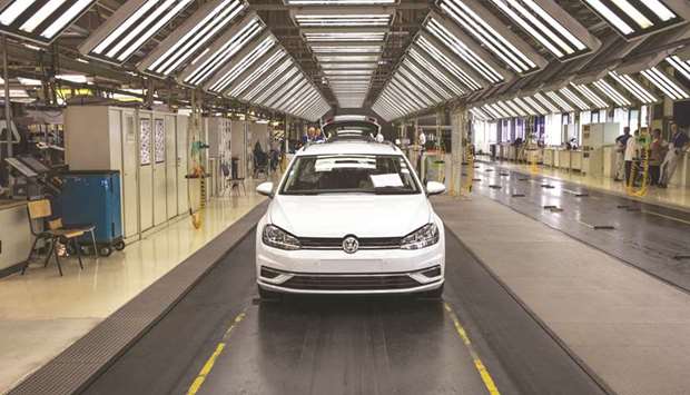 A VW Golf vehicle sits in the final inspection area of the production line at the Volkswagen automobile manufacturing plant in Zwickau, Germany. VW sees a future for the Golf, now entering its eighth iteration.