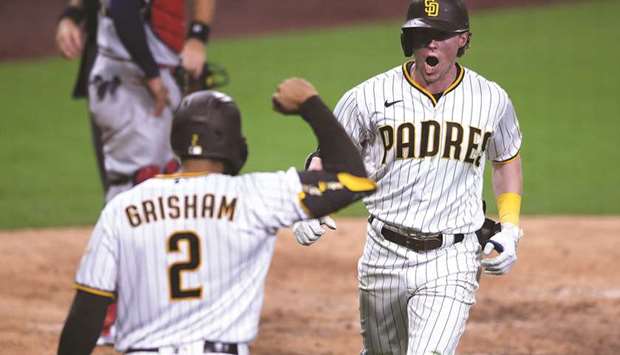 San Diego Padres' Trent Grisham reacts after hitting a home run