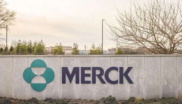 A signage is seen outside the headquarters of Merck & Co in Kenilworth, New Jersey. Merck shares posted their biggest gain in 12 years after the companyu2019s experimental pill slashed the risk of getting seriously ill or dying from Covid-19 in a study, findings that could eventually yield a simple way to treat many virus patients before they ever reach the hospital.