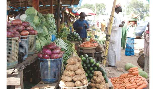 (File photo) Vendors display vegetables for sell, as food prices remain high at a market in Lagos, Nigeria, recently.