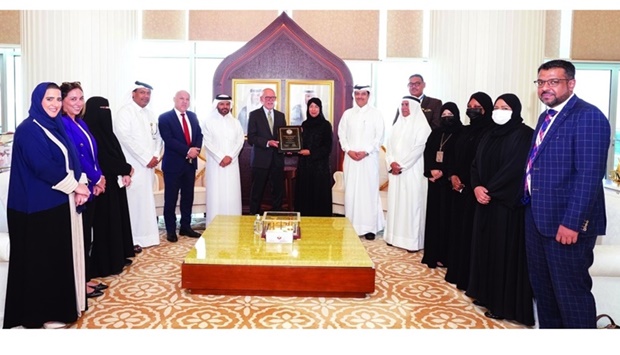 HE the Minister of Public Health Dr Hanan Mohamed al-Kuwari and other officials with PHAB accreditation certificate.