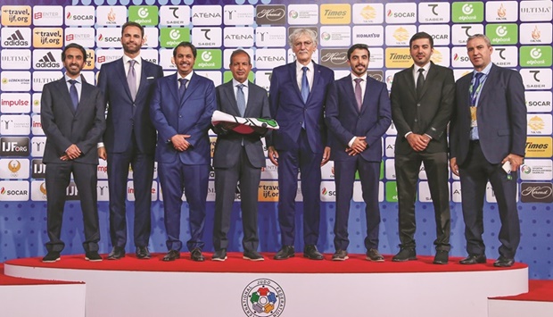 Eid al-Muraikhi, Chairman of the Sports Committee of World Judo Championship u2013 Doha 2023, poses with other officials in Tashkent yesterday.