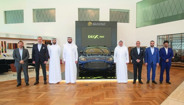 Dignitaries mark the arrival of the Aston Martin DBX707 in Qatar.