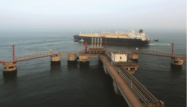 An LNG tanker leaves the dock after discharging at PetroChinau2019s receiving terminal in Dalian, Liaoning province (file). China has told its state-owned gas importers to stop reselling LNG to energy-starved buyers in Europe and Asia in order to ensure its own supply for the winter heating season.