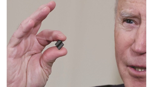 US President Joe Biden Chip in hand technology