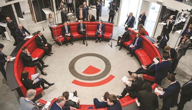 Traders and brokers on the floor of the open outcry pit at the London Metal Exchange. A possible ban on Russian supplies by the LME would be a seismic event for the metals industry, cutting some of the worldu2019s biggest companies off from the main global marketplace.