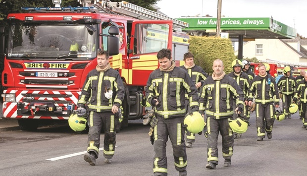 Members of the Emergency services at the scene of an explosion at a petrol station in Creeslough, in the north west of Ireland.