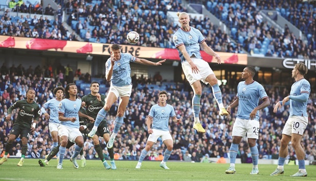 Manchester Cityu2019s Erling Haaland (third right) and Ruben Dias (centre) go for a header during the Premier League match against Southampton at the Etihad Stadium in Manchester yesterday. (Reuters)