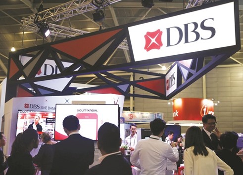 A DBS booth is seen at the Fintech Festival in Singapore. The bank is among companies considering bids for ABN Amrou2019s private-banking business in Asia, people with knowledge of the matter said.