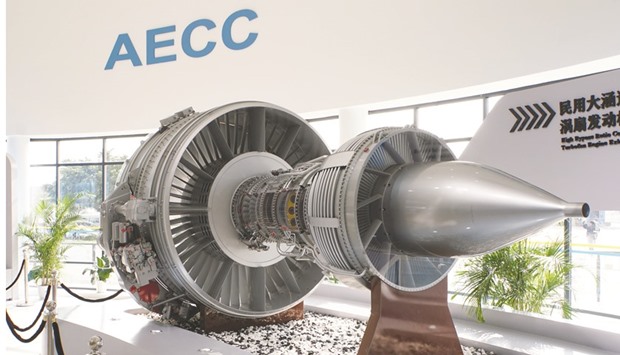 A mock-up of a Chinese-designed high-bypass turbofan engine for Chinau2019s civil jetliner programme is displayed inside the pavilion of a new state-owned engine-making giant, Aero Engine Corporation of China (AECC), at Airshow China in Zhuhai, Guangdong province.