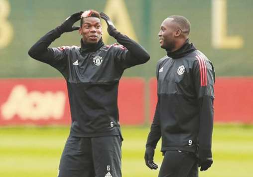 Manchester Unitedu2019s Romelu Lukaku (right) and Paul Pogba during training yesterday. (Reuters)