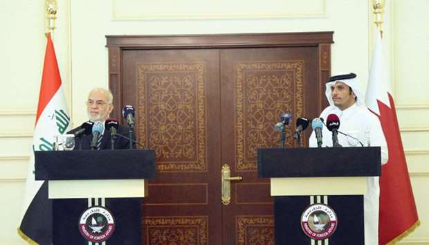 HE the Foreign Minister Sheikh Mohamed bin Abdulrahman al-Thani and his Iraqi counterpart Ibrahim al-Jaafari addressing a joint press conference in Doha yesterday.