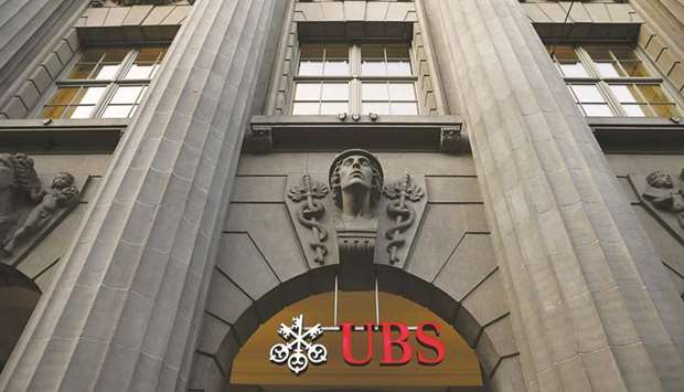 The logo of UBS is seen at its headquarters in Zurich. UBS, JPMorgan and Nomura Holdings have all submitted applications for majority stakes in their Chinese joint ventures, according to regulatory filings.